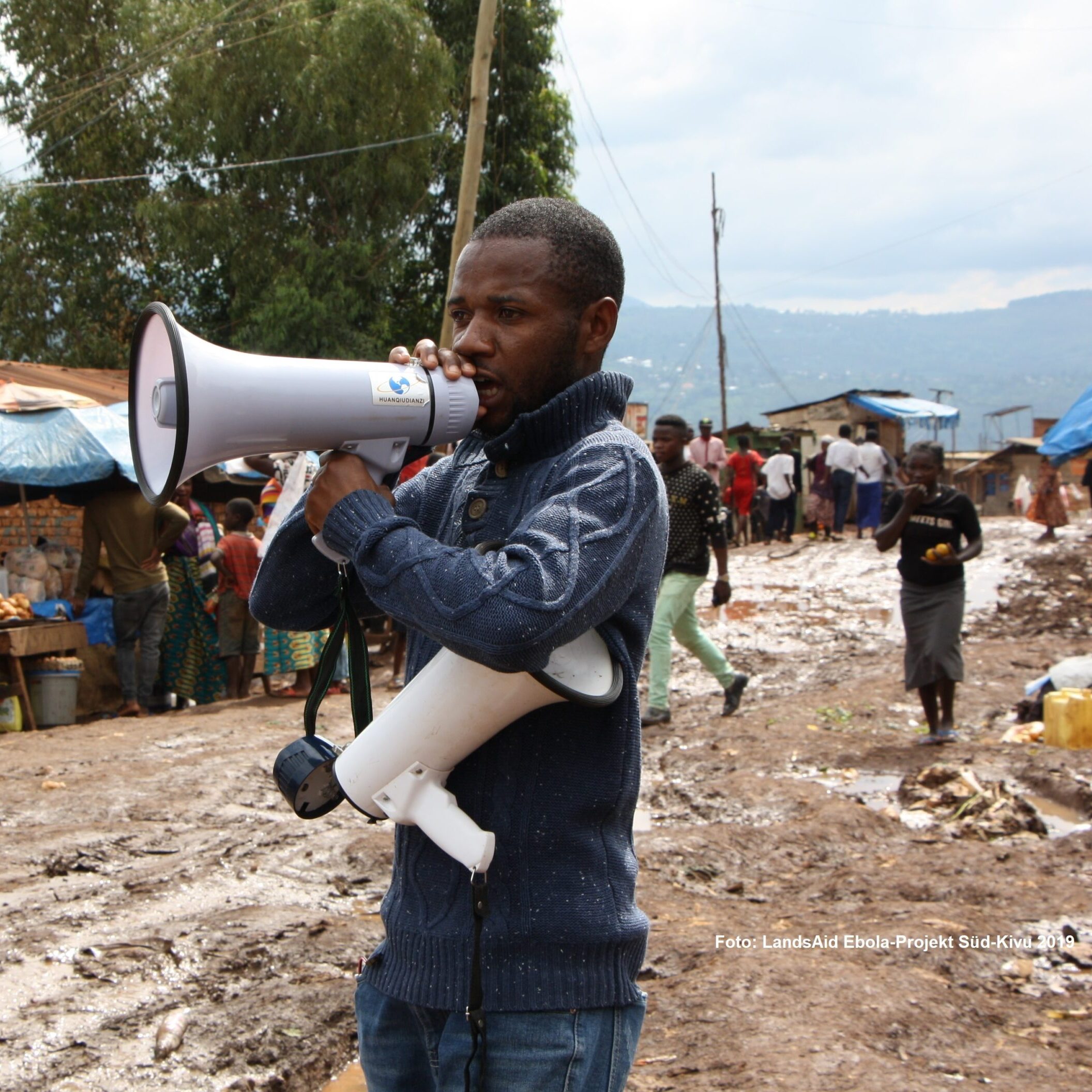 Ebola-Projekt-Sensibilisierungskampagne_Megafon_DRK_Symbolfoto_altes Projekt